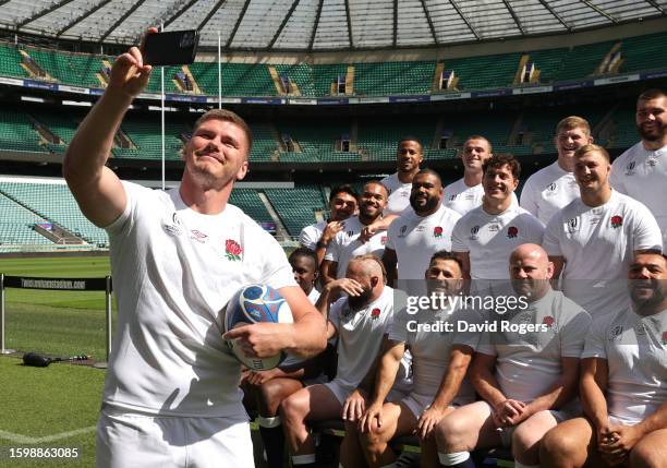 Owen Farrell, the England World Cup captain, takes a selfie with the squad during the England rugby World Cup squad announcement at Twickenham...