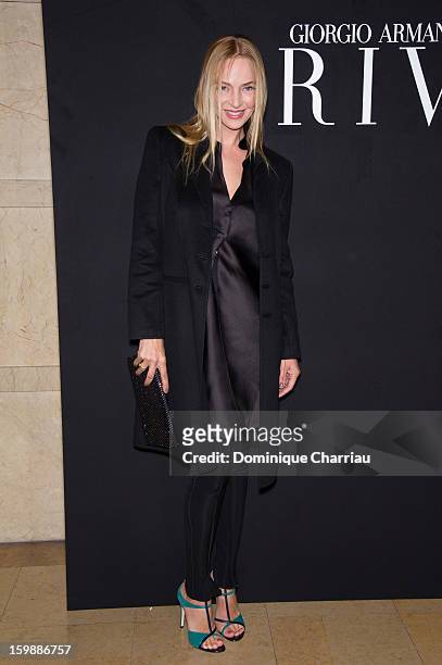 Uma Thurman attends the Giorgio Armani Prive Spring/Summer 2013 Haute-Couture show as part of Paris Fashion Week at Theatre National de Chaillot on...