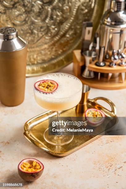 passion fruit martini drink cocktail creamy aperitif with fresh fruit - martini bildbanksfoton och bilder