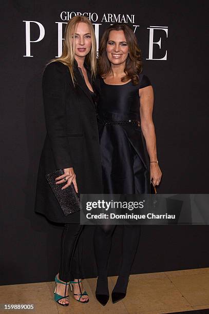 Uma Thurman and Roberta Armani attend the Giorgio Armani Prive Spring/Summer 2013 Haute-Couture show as part of Paris Fashion Week at Theatre...