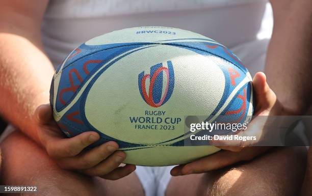 The official France 2023 RWC ball is held by England captain Owen Farrell during the England rugby World Cup squad announcement at Twickenham Stadium...