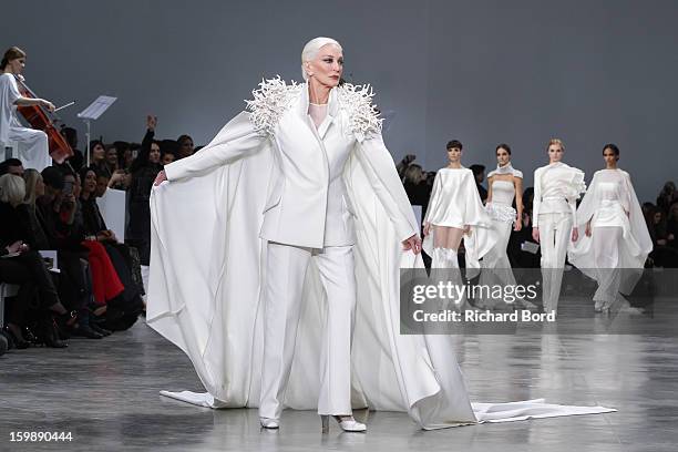 Model Carmen Dell'Orefice walks the runway during the Stephane Rolland Spring/Summer 2013 Haute-Couture show as part of Paris Fashion Week at Palais...