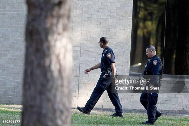 Harris County Sheriff Officers work the scene at Lone Star Campus after a shooting occurred on January 22, 2013 in The Woodlands, Texas. According to...