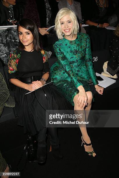 Miroslava Duma and Elena Perminova attend the Giorgio Armani Prive Spring/Summer 2013 Haute-Couture show as part of Paris Fashion Week at Theatre...