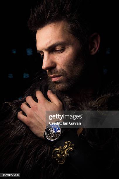 Model poses at the Roger Dubuis booth during the 23rd Salon International de la Haute Horlogerie at the Geneva Palexpo on January 22, 2013 in Geneva,...