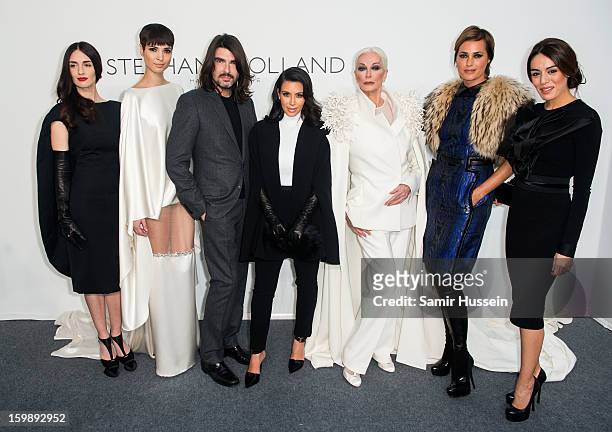 Paz Vega, Hanaa Ben Abdesslem, Stephane Rolland, Kim Kardashian, Carmen Dell'Orefice, Yasmin Le Bon and Sophia Assaidi pose backstage at the Stephane...