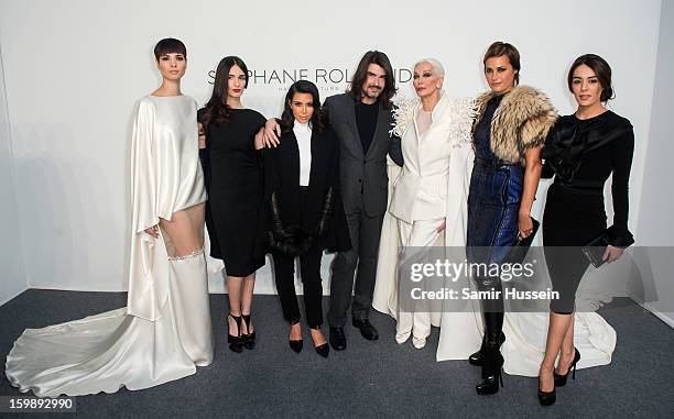 Hanaa Ben Abdesslem, Paz Vega, Kim Kardashian, Stephane Rolland, Carmen Dell'Orefice, Yasmin Le Bon and Sophia Assaidi pose backstage at the Stephane...