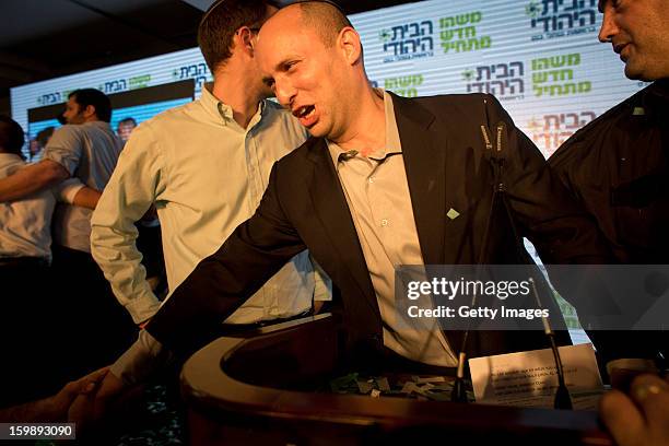 Naftali Bennett, leader of the Habayit Hayehudi party greets supporters and activists from his party at a post-election rally on January 22, 2013 in...