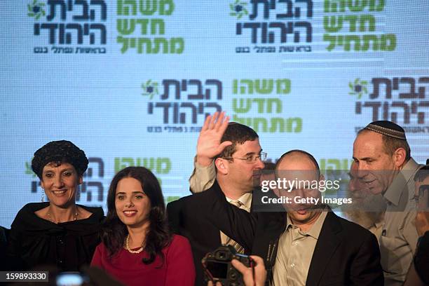 Naftali Bennett , leader of the Habayit Hayehudi party waves to supporters from his party at a post-election rally on January 22, 2013 in Ramat Gan,...