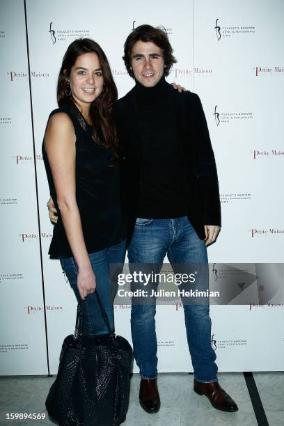 Anouchka Delon and Julien Dereins attend 'La Petite Maison De Nicole' Inauguration Photocall at Hotel Fouquet's Barriere on January 22, 2013 in...