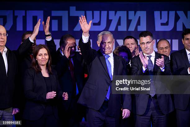 Israeli Prime Minister Benjamin Netanyahu waves to his supporters at his election campaign headquarters on Janurary 23, 2013 in Tel Aviv, Israel....