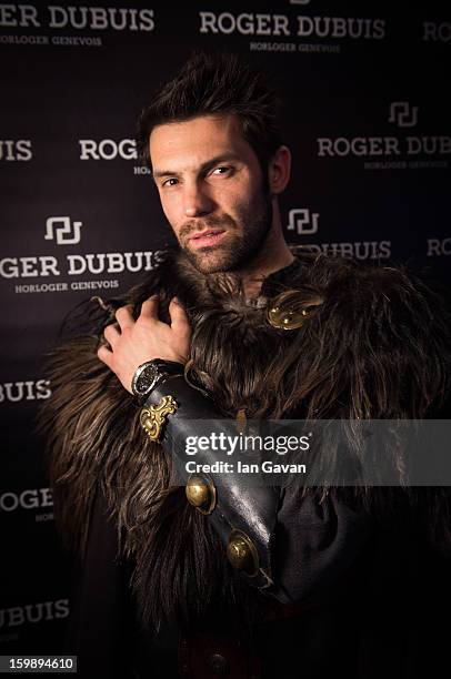 Model poses at the Roger Dubuis booth during the 23rd Salon International de la Haute Horlogerie at the Geneva Palexpo on January 22, 2013 in Geneva,...