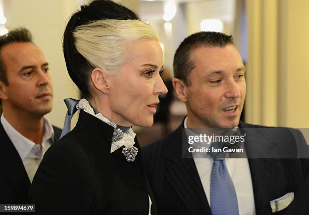 Jean-Marc Pontroue , CEO of Roger Dubuis talks to Daphne Guinness, friend of the brand as she visits the Roger Dubuis booth during the 23rd Salon...