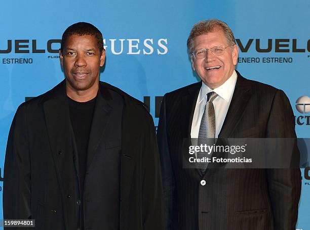 Actor Denzel Washington and director Robert Zemeckis attend the premiere of 'El Vuelo' at Capitol Cinema on January 22, 2013 in Madrid, Spain.