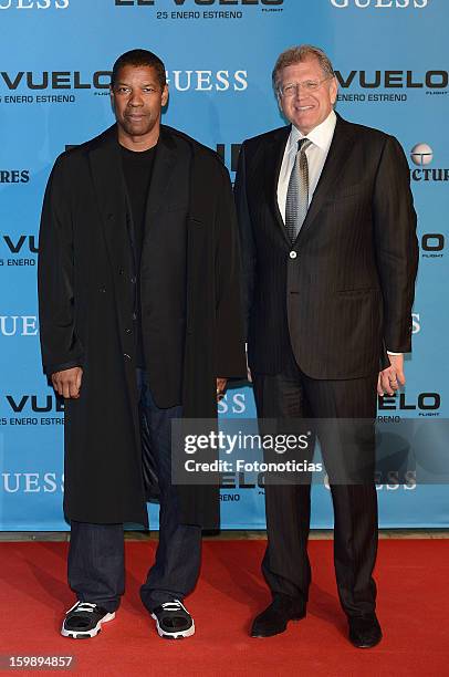 Actor Denzel Washington and director Robert Zemeckis attend the premiere of 'El Vuelo' at Capitol Cinema on January 22, 2013 in Madrid, Spain.
