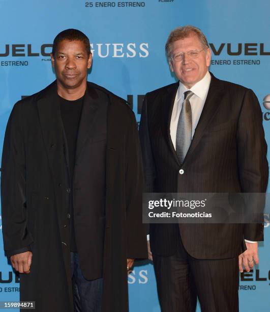 Actor Denzel Washington and director Robert Zemeckis attend the premiere of 'El Vuelo' at Capitol Cinema on January 22, 2013 in Madrid, Spain.