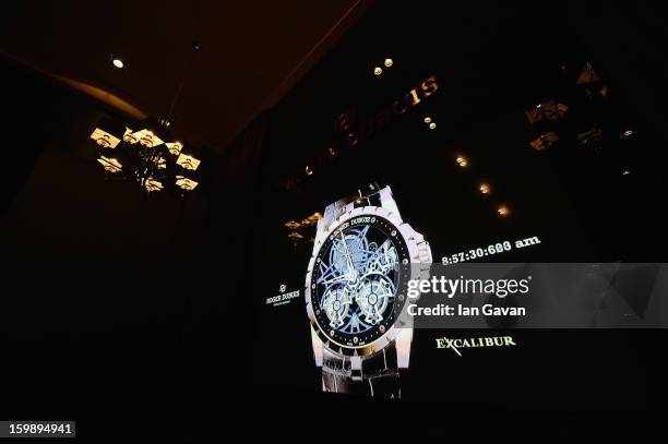 An Excalibur watch is displayed on the screen inside the press conference room of the Roger Dubuis booth during the 23rd Salon International de la...