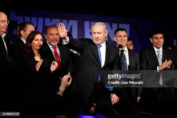 Israeli Prime Minister Benjamin Netanyahu waves to supporters at his election campaign headquarters on Janurary 23, 2013 in Tel Aviv, Israel....