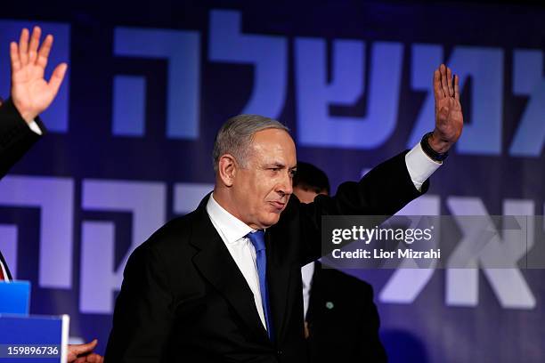 Israeli Prime Minister Benjamin Netanyahu waves to supporters at his election campaign headquarters on Janurary 23, 2013 in Tel Aviv, Israel....