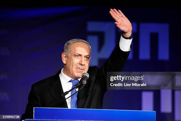 Israeli Prime Minister Benjamin Netanyahu waves to supporters at his election campaign headquarters on Janurary 23, 2013 in Tel Aviv, Israel....