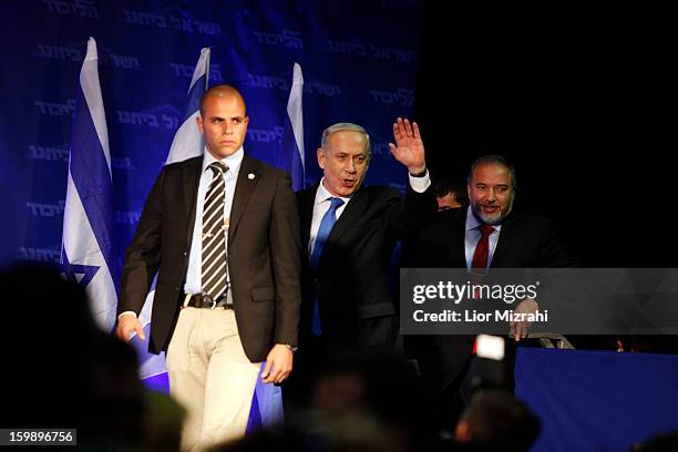 Israeli Prime Minister Benjamin Netanyahu waves to supporters at his election campaign headquarters on Janurary 23, 2013 in Tel Aviv, Israel....