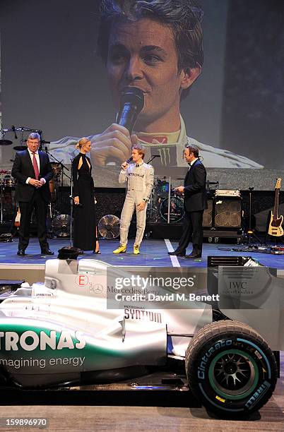 Ross Brawn, Karolina Kurkova, Nico Rosberg and Kevin Spacey attend the IWC Schaffhausen Race Night event during the Salon International de la Haute...