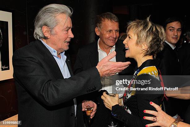 Alain Delon and Veronique Jannot attend 'La Petite Maison De Nicole' Inauguration Cocktail at Hotel Fouquet's Barriere on January 22, 2013 in Paris,...