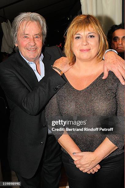 Alain Delon and Michele Bernier attend 'La Petite Maison De Nicole' Inauguration Cocktail at Hotel Fouquet's Barriere on January 22, 2013 in Paris,...