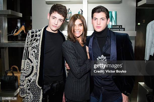 Harry Brant, Carine Roitfeld and Peter Brant Jr attends the Giorgio Armani Paris avenue Montaigne boutique opening on January 22, 2013 in Paris,...