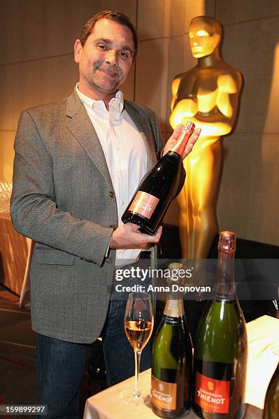 President and CEO of Champagne Thienot, Francois Peltereau-Villeneuve, holding Thienot Rose during a preview of the 85th Academy Awards Governors...