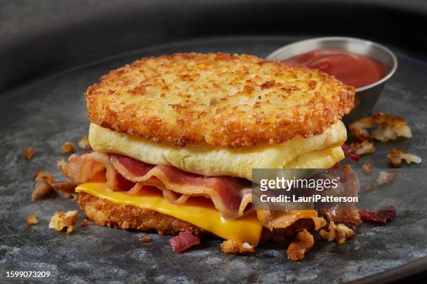 hash brown breakfast sandwich - hash brown stock pictures, royalty-free photos & images