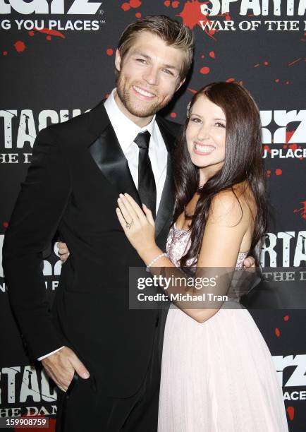 Liam McIntyre and Erin Hasan arrive at the Los Angeles premiere of "Spartacus: War Of The Damned" held at Regal Cinemas L.A. LIVE Stadium 14 on...