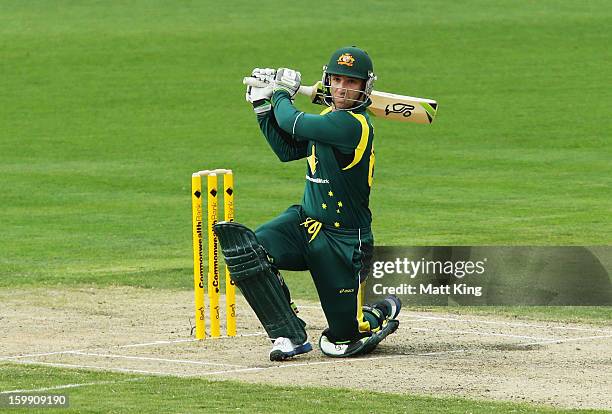 Phil Hughes of Australia hits a four during game five of the Commonwealth Bank One Day International series between Australia and Sri Lanka at...