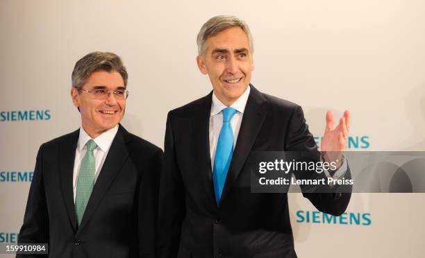 Peter Loescher , President and Chief Executive Officer of Siemens AG, and Joe Kaeser, Member of the Managing Board and Head of Corporate Finance and...