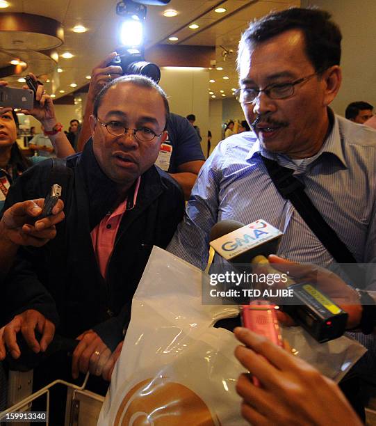 Mario Catiis and Ramon Tertosa , Filipino labourers working at the time when Islamists siezed workers at a gas plant in Algeria but were not taken...