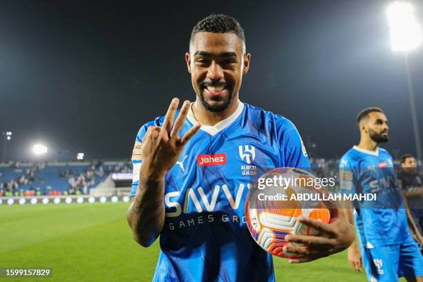 Hilal's Brazilian forward Malcom gestures as he poses after his team's win of the Saudi Pro League football match between Abha and Al-Hilal at the...