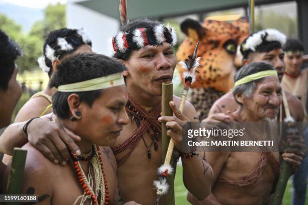 Members of the Waorani indigenous community demonstrate for peace, for nature and to promote a Yes vote in an upcoming referendum to end oil drilling...