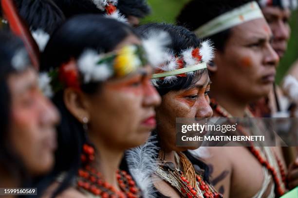 Members of the Waorani indigenous community demonstrate for peace, for nature and to promote a Yes vote in an upcoming referendum to end oil drilling...