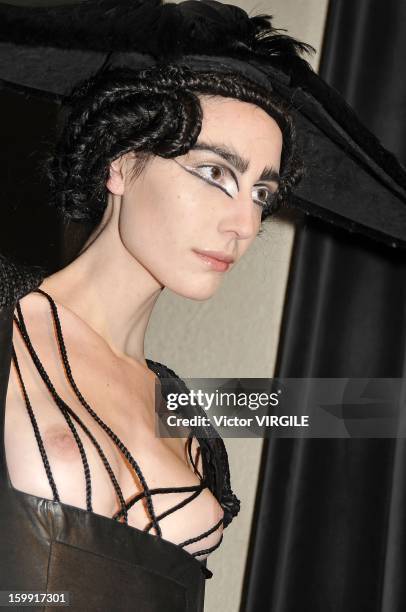 Model presents a creation made with hair by Charlie Le Mindu, hairdresser and designer, during a 'Haute Coiffure' fashion show during Spring/Summer...