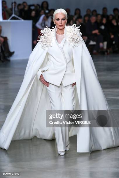 Model Carmen Dell'Orefice walks the runway during the Stephane Rolland Spring/Summer 2013 Haute-Couture show as part of Paris Fashion Week at Palais...