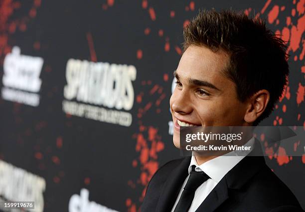 Actor Christian Antidormi arrives at the premiere of Starz's "Spartacus: War Of The Damned" at the Regal Cinemas L.A. Live on January 22, 2013 in Los...