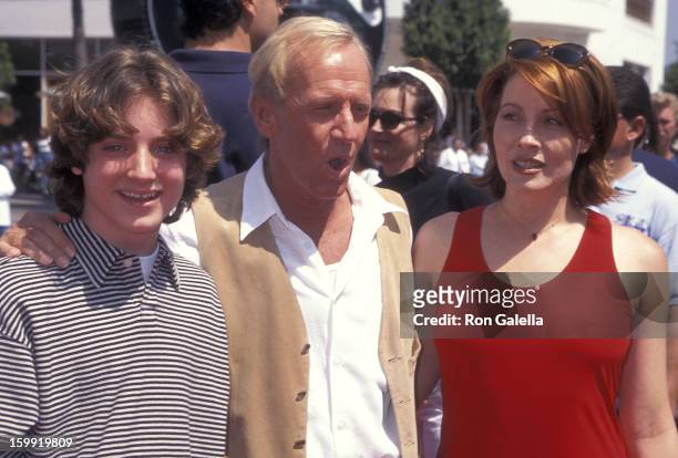 Actor Elijah Wood, actor Paul Hogan and wife actress Linda Kozlowski attend the "Flipper" Universal City Premiere on May 5, 1996 at the Cineplex...