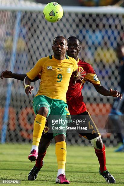 Katlego Mphela of South Africa holds up the ball during the 2013 African Cup of Nations match between South Africa and Angola at Moses Mahbida...