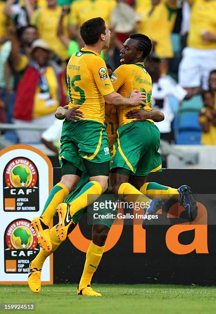 May Mahlangu and Dean Furman of South Africa celebrate the opening goal during the 2013 African Cup of Nations match between South Africa and Angola...