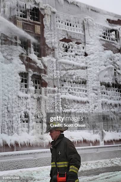 Firefighters work to extinguish a massive blaze at a vacant warehouse on January 23, 2013 in Chicago, Illinois. More than 200 firefighters battled a...