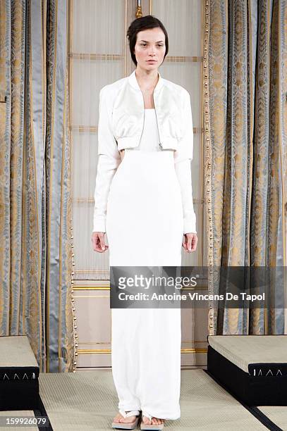 Model walks for the runway of the Didit Hediprasetyo Spring/Summer 2013 Haute-Couture show as part of Paris Fashion Week at Shangri-La Hotel Paris on...