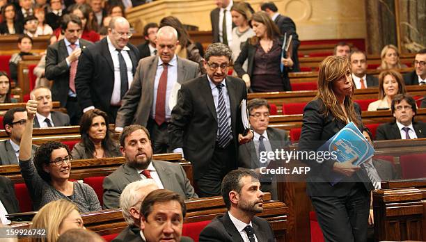 Popular Party leader of the Catalonia region Alicia Sanchez Camacho leaves the Chamber during the 10th legislative term of the Catalan Parliament in...