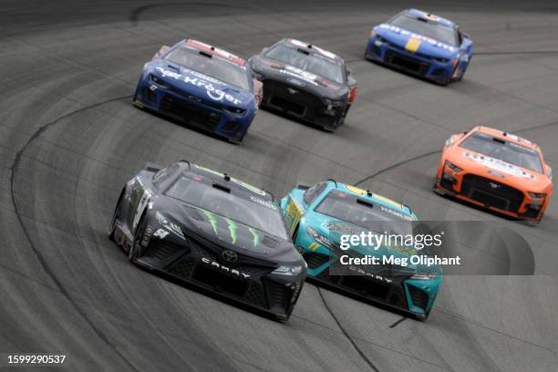 Ty Gibbs, driver of the Monster Energy Toyota, Denny Hamlin, driver of the Mavis Tires & Brakes Toyota, Kevin Harvick, driver of the Busch Light...