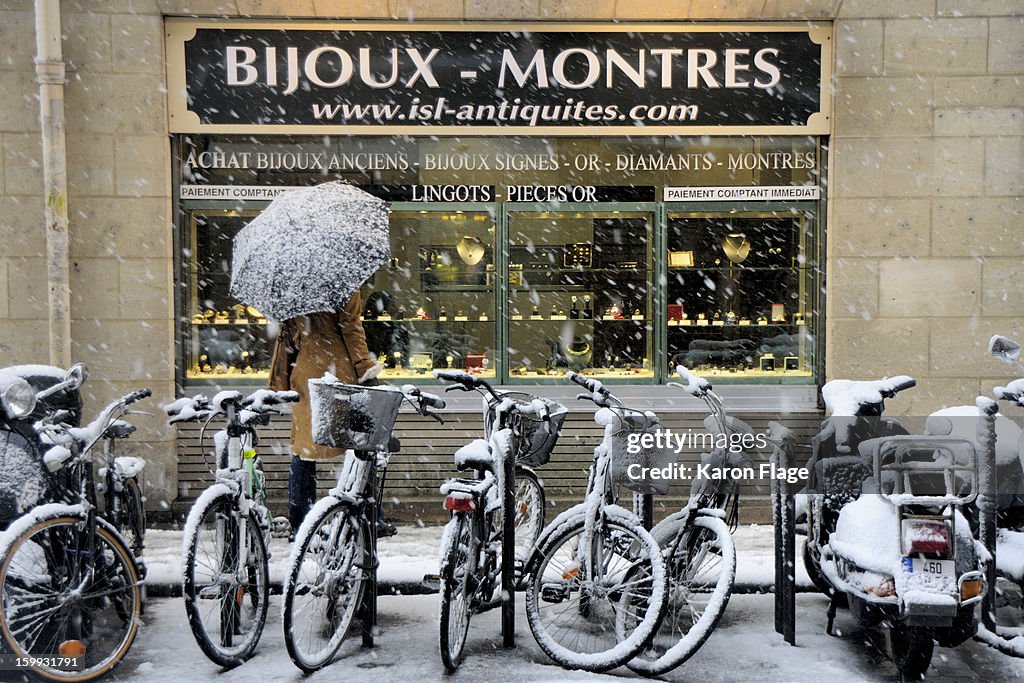 Paris Window Shopping in a snow storm