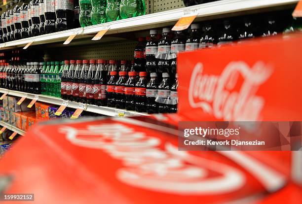 Soft drinks are displayed on the shelf of a local market on January 23, 2013 in Los Angeles, California. According to reports, carbonated soft drink...